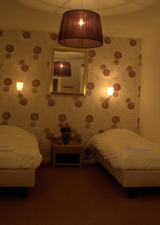 Hotel "De Steenen Man" Zurich Bagian luar foto