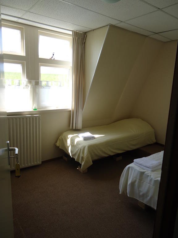 Hotel "De Steenen Man" Zurich Ruang foto