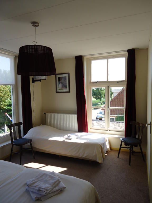 Hotel "De Steenen Man" Zurich Ruang foto