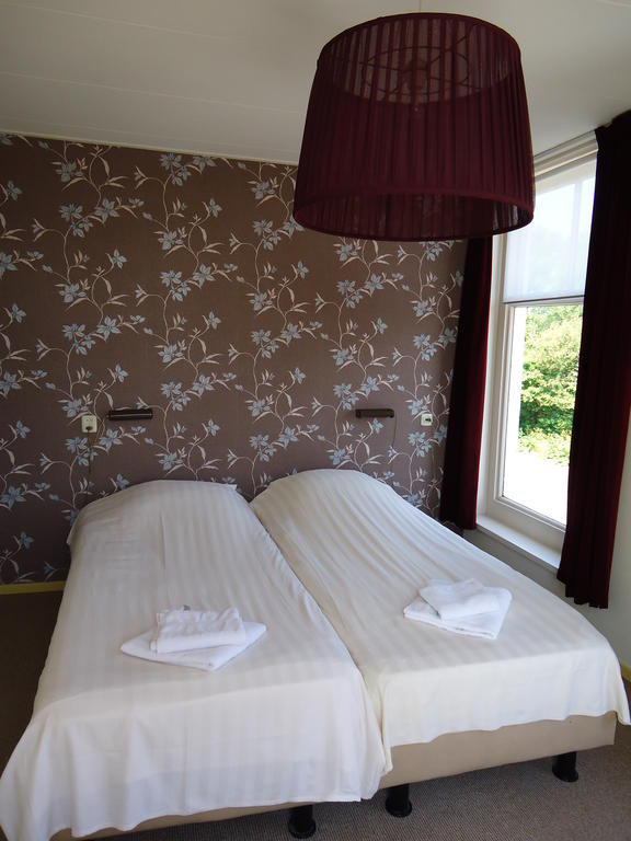 Hotel "De Steenen Man" Zurich Bagian luar foto